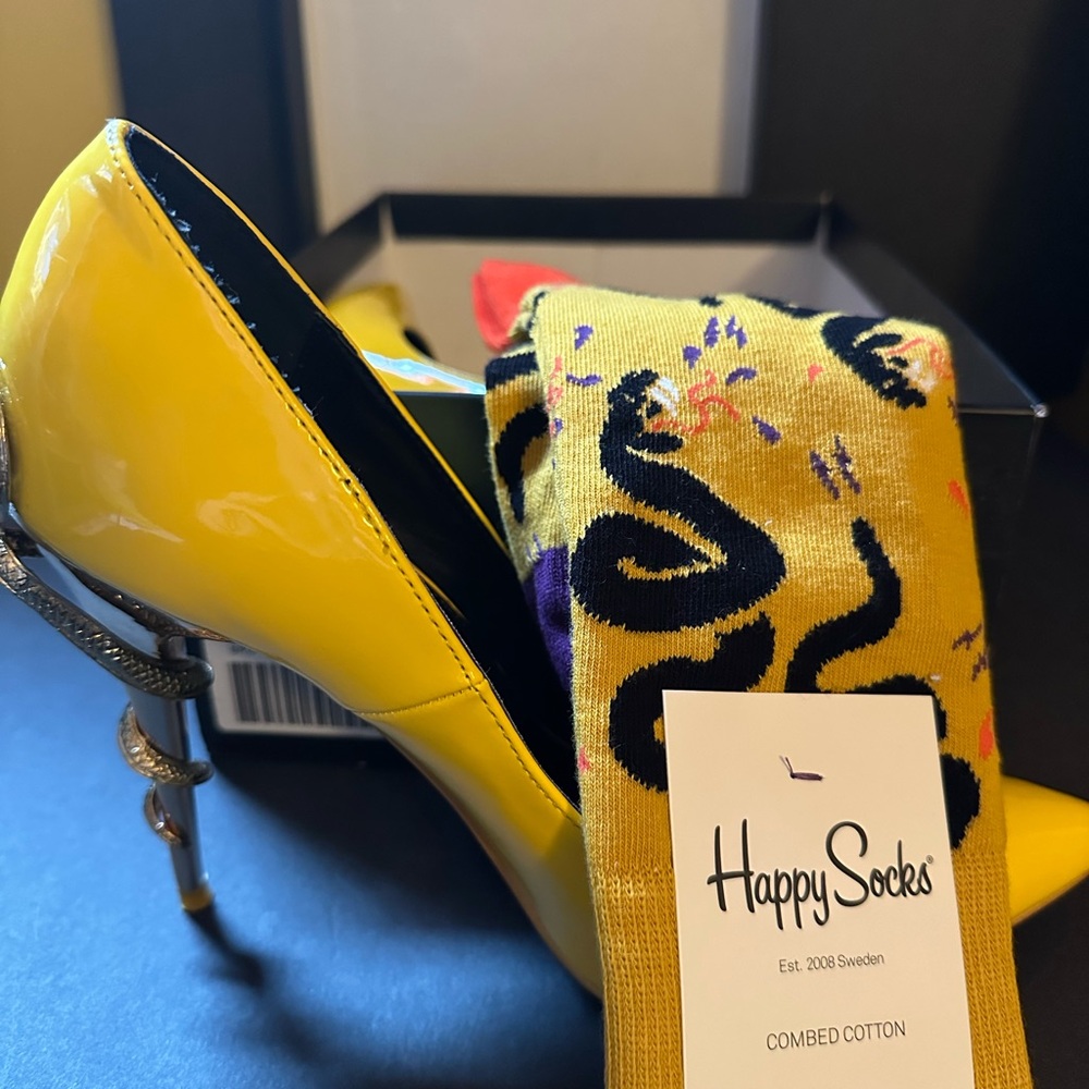 Snake heels with men’s socks to match